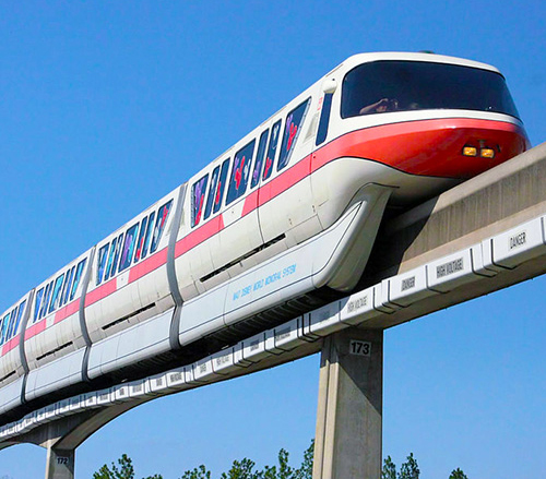 Walt Disney World monorail train in transit, seen from the ground