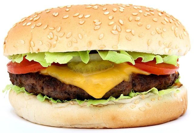 Hamburger with cheese, lettuce, tomato, onion, and pickle