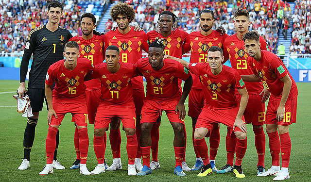 The Belgian national football team posing for a photo before a 2018 World Cup game