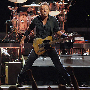 Bruce Springsteen performing on stage with Telecaster guitar